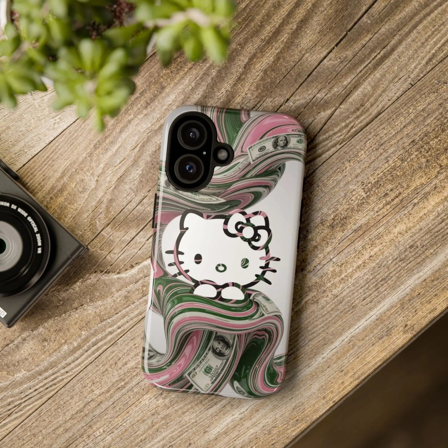 Hello Kitty Money Swirl Tough iPhone16 Case — Cute Pink & Green Protective Cover Printify