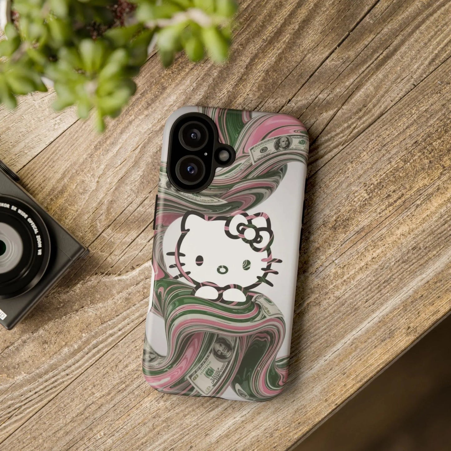 Hello Kitty Money Swirl Tough iPhone16 Case — Cute Pink & Green Protective Cover Printify